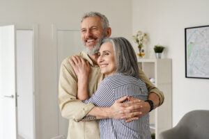 happy senior couple reverse mortgage concept