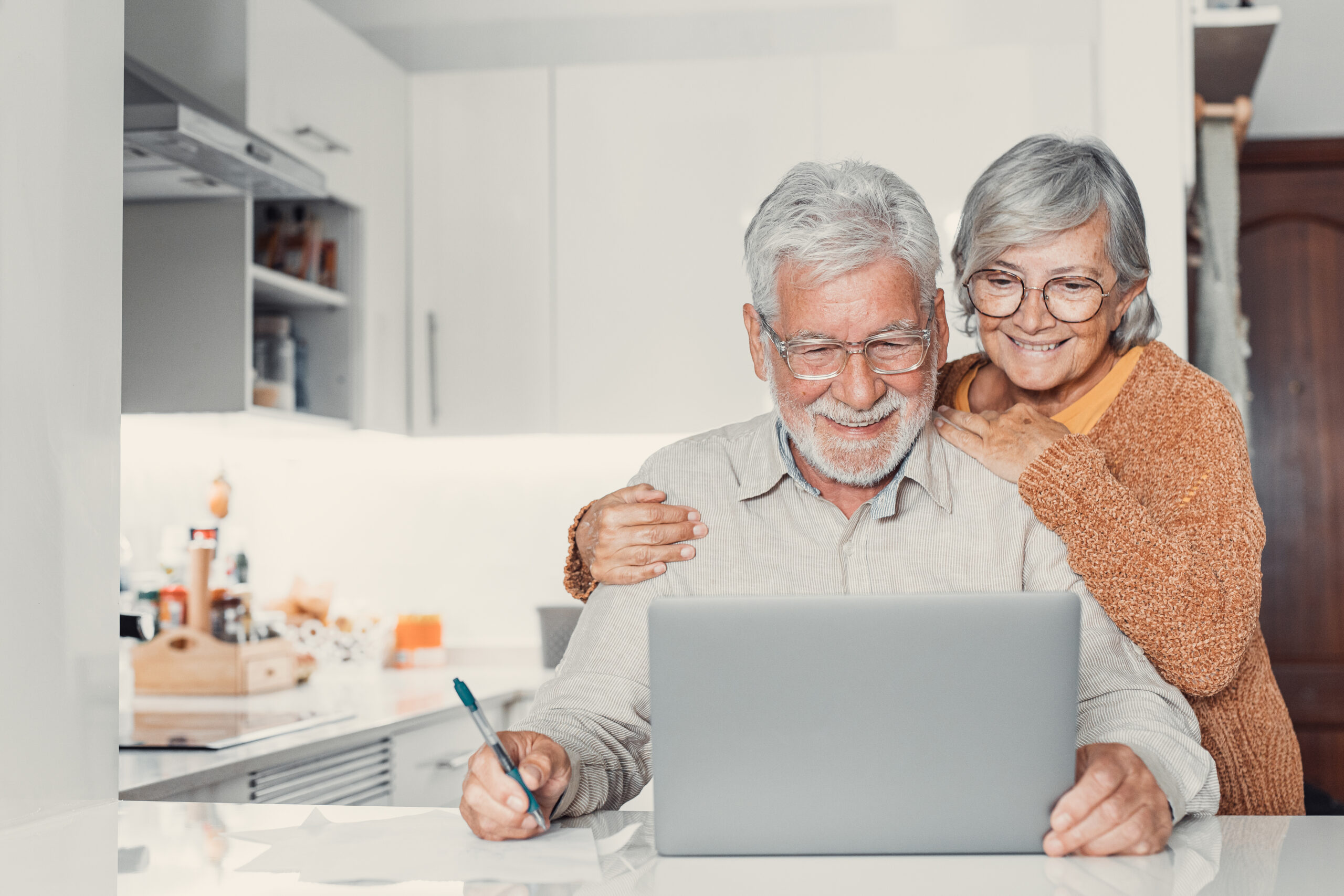 happy senior couple reverse mortgage concept