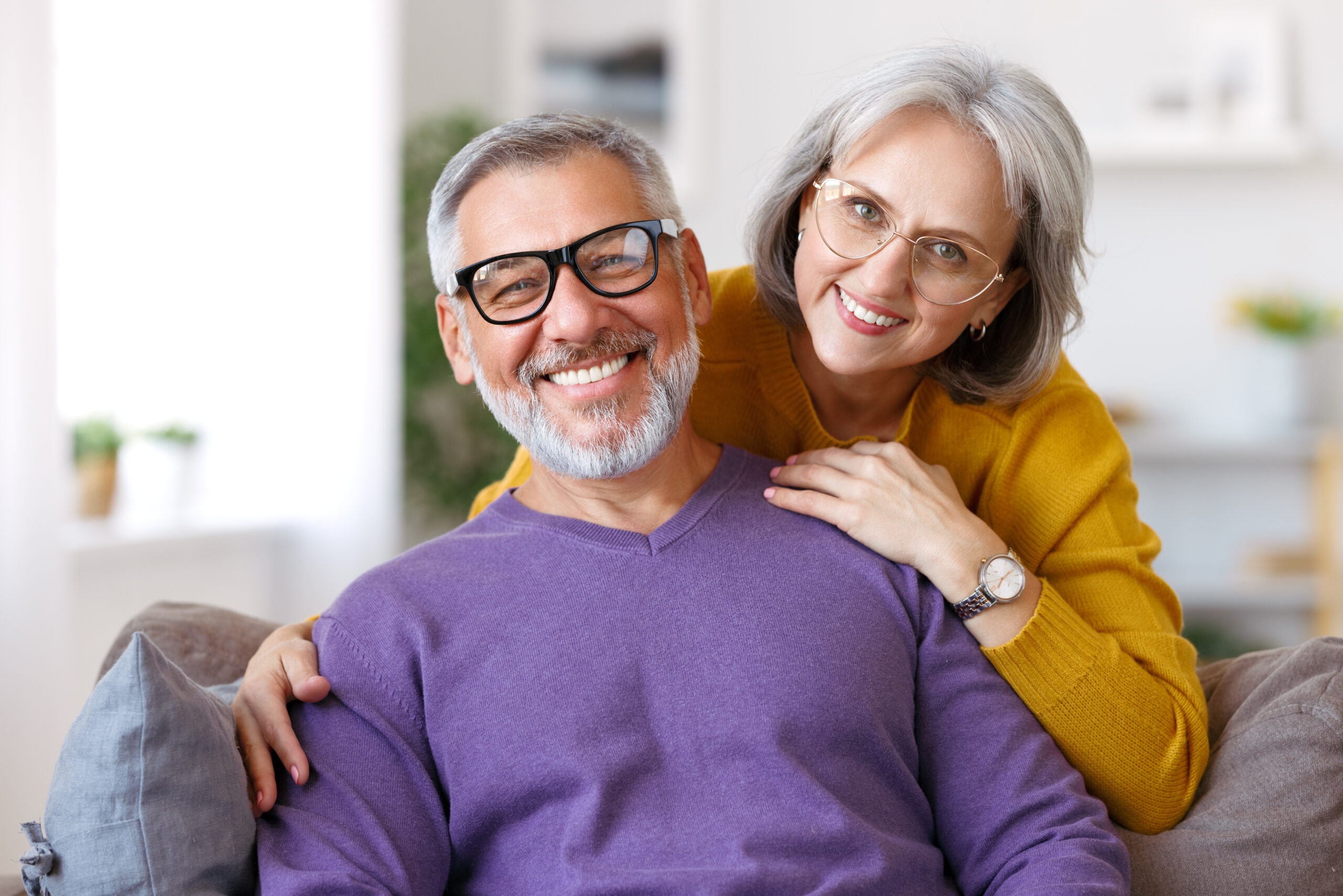 happy senior couple reverse mortgage concept