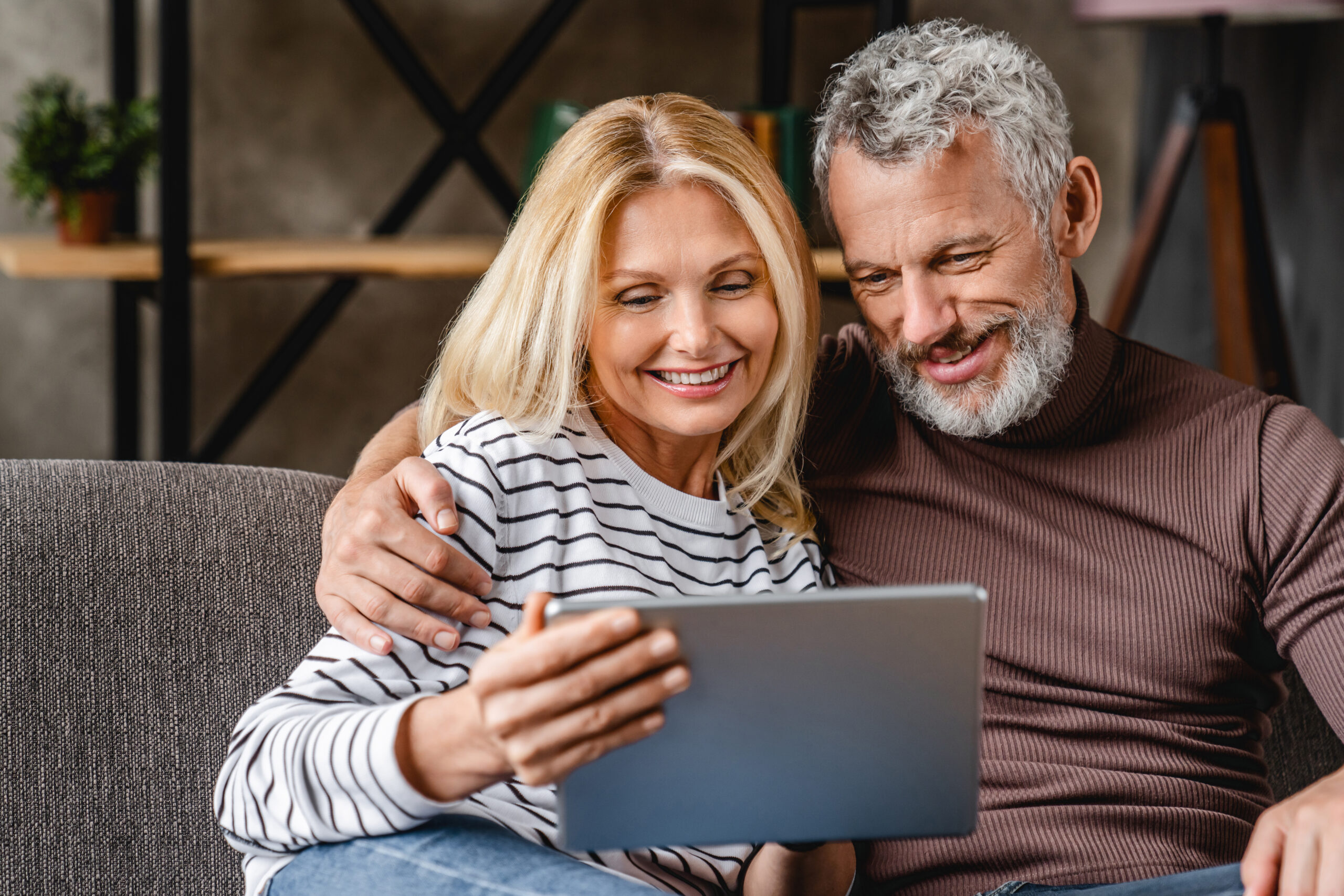 Couple looking at reverse mortgages